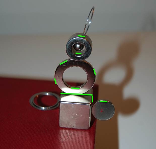 Below: Both artistic and interesting, the key point is the illuminate the nature of and differentiate the magnetic induction of steel with increased dielectric capacitance of a neodymium (or any “magnet”) wherein which f