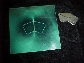 Below: The dielectric inertial plane of a typical hard drive magnet, on right is the conjunction of a folding magnet, having folded once already. This cross is the dielectric counterspace which will, given the chance, fo