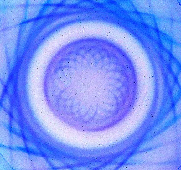 Below: Inverted real magnetism image I created of a 1.25” ring magnet on left, top down, thru a ferrocell, likewise on right, a 1” cube neodymium magnet seen edge on along the dielectric inertial plane, with, top and bot