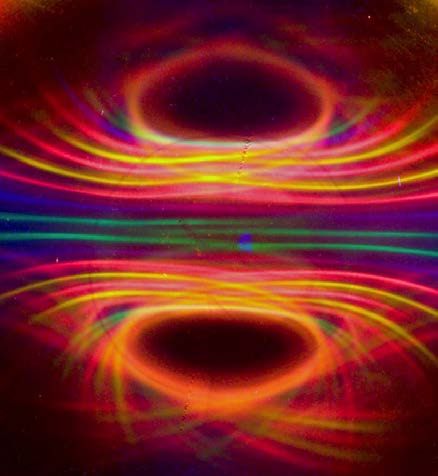 Below: [Photo courtesy of Michael Snyder of revolution-labs.com]. Image on left showing the blue and green (high Z-axis radial dielectric capacitance) being directed along the dielectric inertial plane. Image on right sh