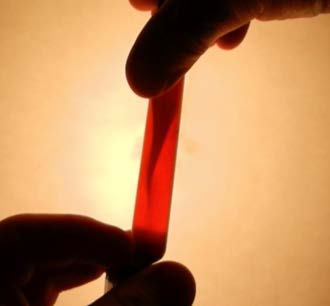 BELOW: One of my own inventions of a ferrofluid suspension, which give a 25+ second window on the magnetic vortex. Close inspection (now scaled up from this test tube demo) shows a double helical vortex just like a water