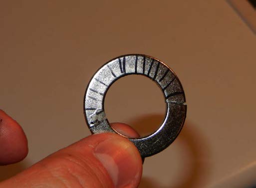 after broken. On right, the black markings indicate that this piece, or half-portion of the ring was originally located on the other side. While this LOOKS ‘re-assembled’ it is not; it is the only way (other than on top 