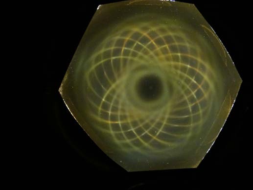 Below: ½” cylinder magnet along one pole on the left, and two of the same cylinder magnets on the right connected along their non-polarized sides. Notice the voidance pattern in the middle between these four poles.