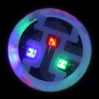 Below: On left, RGB LED cell, middle 3.1mm RGB element. Far right, greatly filtered light showing the RGB elements illuminated. Under normal viewing, the light is intensely white and there are no red green or blue elemen