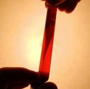 BELOW: One of my own inventions of a ferrofluid suspension, which give a 25+ second window on the magnetic vortex. Close inspection (now scaled up from this test tube demo) shows a double helical vortex just like a water