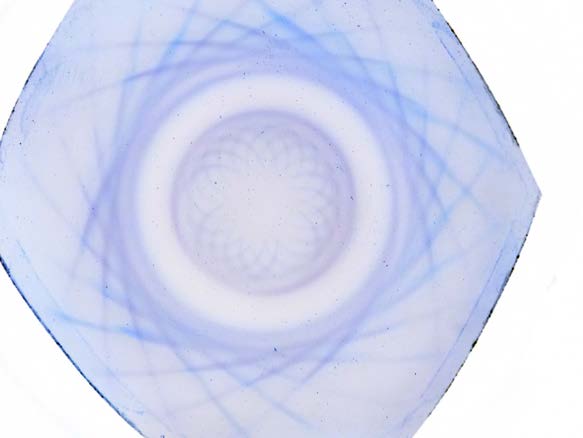 Below: Two color inverted images of ring magnets under the ferrocell. Notice the perfect pair of inner and outer hypotrochoid of convergence and divergence.