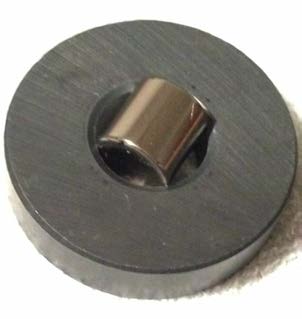 Below: Notice distorted pole on image both left and right as created by image in center of a ½ cylinder magnet stuck in the center of a much larger ceramic ring magnet. All field pressures mediate themselves as necessita