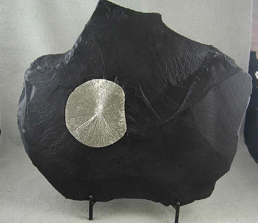 Below: Left is a pyrite dollar or “sun” in anthracite coal shale which is nearly 100% dielectric carbon which concentrates this dielectricity in formation in iron sulfide with both high dielectric permetivity and magneti
