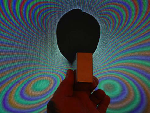 Below: Very close proximity complete dielectric displacement from the centrifugal magnetism. On left from the centrifugal magnetism face-on. On the right from the centrifugal magnetism edge on showing the four corners, o