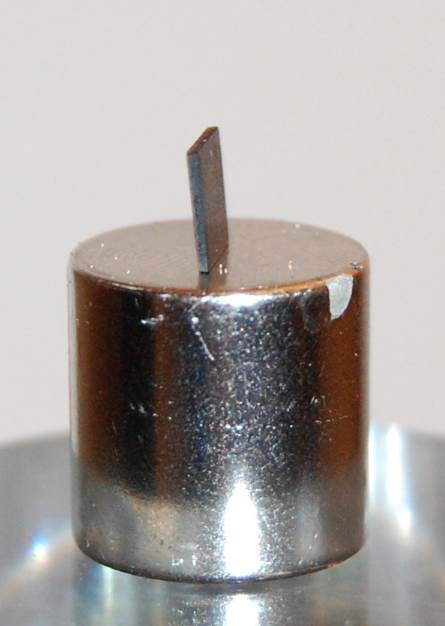 Below: When you understand how magnetism and dielectricity mediate out each others pressures the images below become lucid and clear child’s play intellectually. On the right we have pyrolytic graphite resting on its thi
