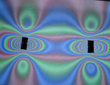 Below: Left, a pair of cylinder magnets, in the middle a sphere magnet, on the right the field illustrations.