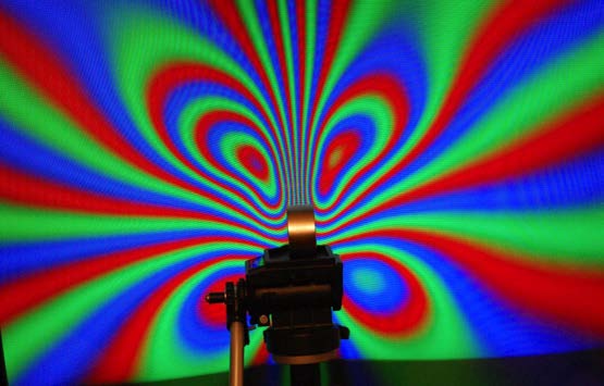 Below: Showing vertical orientation of the magnet relative to the CRT screen, and on the right the four loops of either sides four edges of centrifugal magnetism marked by black arrows. Likewise showing the centripetal e
