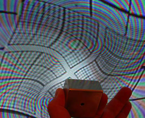 Below: On left, we have the grid being twisted clockwise, on the right we have the projected grid, a dielectric projection of electrostatics being twisted counterclockwise on the inverse pole of the magnet.